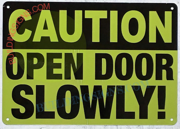CAUTION: OPEN DOOR SLOWLY SIGN