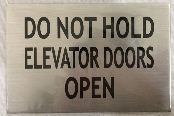 Do not hold elevator dooes open ( 6x4 inch silver)