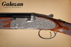 A10 - O/U Sidelock, Platinum Ornamental, 12ga. 28" Barrels with Screw-in Choke Tubes. #39471