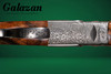 A10 - O/U Sidelock, Platinum Ornamental, 12ga. 30" Barrels with Screw-in Choke Tubes. #34093
