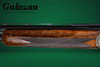 A10 - O/U Sidelock, Platinum Ornamental, 12ga. 30" Barrels with Screw-in Choke Tubes. #34093