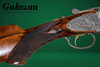 A10 - O/U Sidelock, Platinum Ornamental, 12ga. 30" Barrels with Screw-in Choke Tubes. #34093