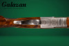 A10 - O/U Sidelock, Deluxe Pointer & Setter, 12ga. 28" Barrels with Screw-in Choke Tubes. #23932