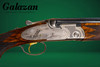A10 - O/U Sidelock, Deluxe Pointer & Setter, 12ga. 28" Barrels with Screw-in Choke Tubes. #23932