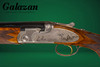 A10 - O/U Sidelock, Deluxe Pointer & Setter, 12ga. 28" Barrels with Screw-in Choke Tubes. #23932