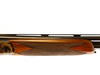 Revelation - Case Colored, O/U, 20ga. 30" Barrels with 5 Screw-in Choke Tubes. #63891