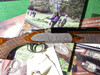 RSP - Sideplated, O/U, Rose & Scroll, Engraved By Briton, 20ga. 28" Barrels with Screw-in Choke Tubes. #89925