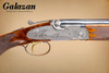 A10 - O/U Sidelock, Deluxe, 20ga. 30" Barrels with Screw-in Choke Tubes. #93907