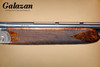 A10 - O/U Sidelock, Deluxe, 20ga. 30" Barrels with Screw-in Choke Tubes. #93907