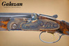 A10 - O/U Sidelock, Rose & Scroll, Two Barrel Set, 20ga/28ga. 30" Barrels & 30" Barrels. #95589