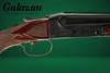 Winchester -  Model 21, SxS, Deluxe Duck Grade, 12ga. 32" Barrels Choked F/M. #94951