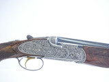 A10 - O/U Sidelock, Platinum, Rare VL&A Edition, Ornamental Scroll, 12ga. 28” Barrels with Screw-in Choke Tubes. #24594