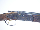 A10 - O/U Sidelock, Rose & Scroll, 20ga. 28” Barrels with Screw-in Choke Tubes.  #49774