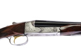 Winchester - Model 21, SxS, Robert Swartley Engraved, 20ga. 26" Barrels Choked IC/M.  #73541