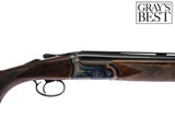 Revelation - Case Colored, O/U, 20ga. 26" Barrels with 5 Screw-in Choke Tubes. #74022