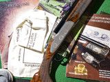 RSP - Sideplated, O/U, Rose & Scroll, Engraved By Briton, 20ga. 28" Barrels with Screw-in Choke Tubes. #89925