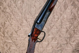 Winchester - Model 21, SxS, Trap Grade, Gold Inlay & Line Work, #2 Pattern, 12ga. 30" Barrels Choked IC/M. #92510