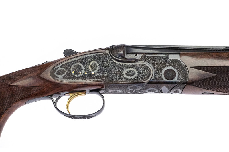 A10 - O/U Sidelock, Rose & Scroll, 12ga. 30" Barrels with Screw-in Choke Tubes. #47124