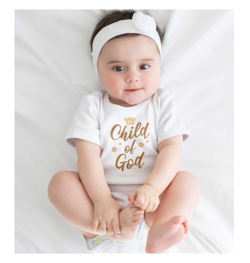 Precious baby girl wearing white 'Child of God' bodysuit – perfect baby shower gift