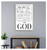 Scripture Wall Art Print on taupe wall / Featuring "Be Still and know that I AM God" / Psalm 46:10 / Classic black text in a modern layout design and sleek 1/4" maple wood frame.