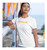 Christian T-shirt featuring 'Lord of Lords, King of Kings' on the back and 'JESUS' on the front in gold lettering.