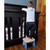 Child standing on Sky Blue Gumdrop Step Stool to safely reach crib, showing stability and everyday use