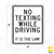 NO TEXTING WHILE DRIVING IT'S THE LAW! Sign