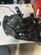 2015–2022 GMC Canyon left/driver-side OEM headlight assembly.