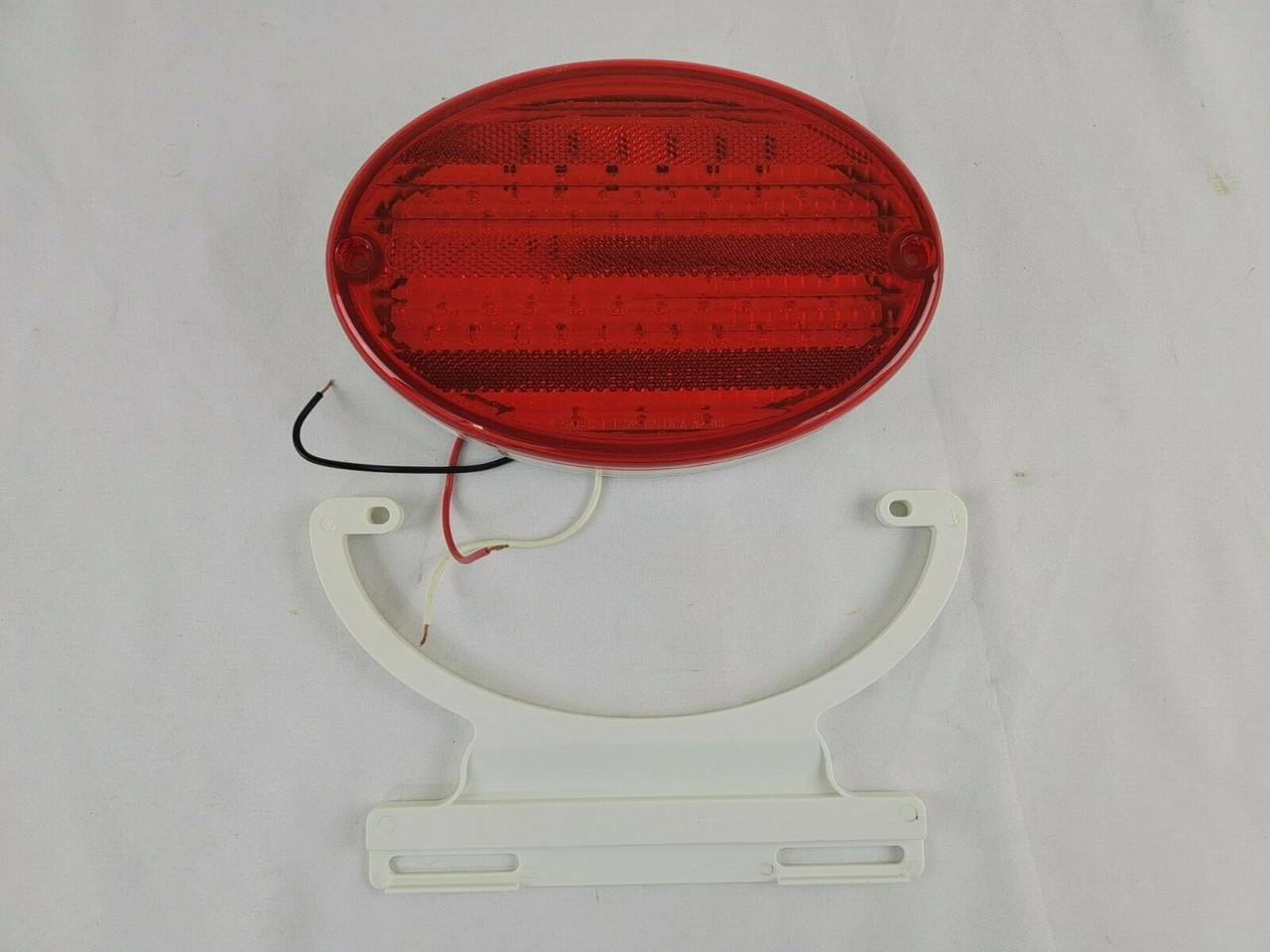 Diamond Group Kaper II 8" Oval LED Stop Turn Tail Light w/ License Plate Bracket