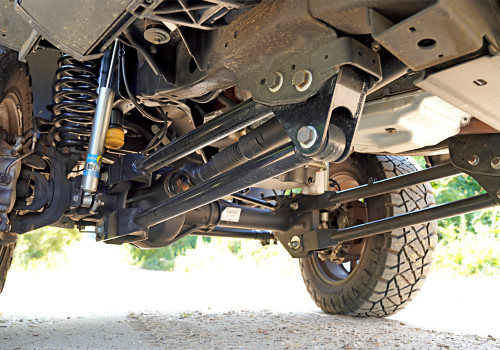 11-16 Ford F250/F350 4WD 4in Suspension Lift Kit w/4-Link Conversion King Clvrs/Shocks - Superlift Suspension