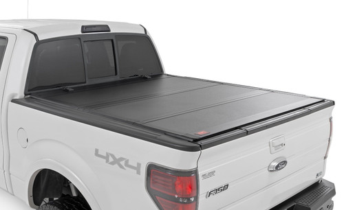 04-14 Ford F150 5ft 7in Bed Hard Tri-Fold Flip Up Bed Cover - Rough Country