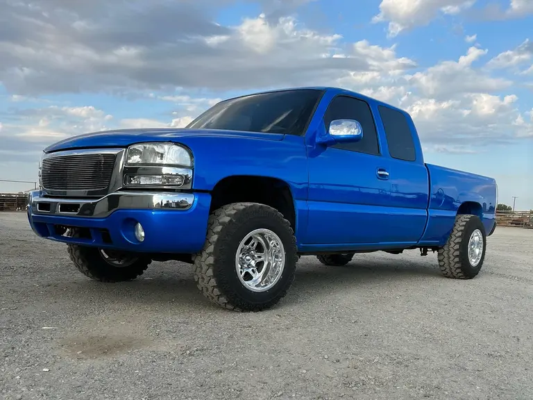2003 Sierra 1500, leveled, 31x12.50R16 on 16x12 Weld Cheyenne