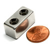 Close-up of six #6 countersunk holes on rare earth NdFeB bar magnet with NiCuNi plating, highlighting corrosion resistance and 37 lbs pull force