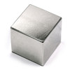 N42 Neodymium Cube Magnet in use, demonstrating its super strong magnetic force