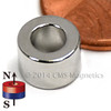 Close-up of 8.1 lbs pull force neodymium ring magnet illustrating precision 1/4-inch thickness.
