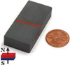 Strong C8 ferrite block magnet close-up - 1-7/8 inch x 7/8 inch x 3/8 inch black ceramic industrial grade