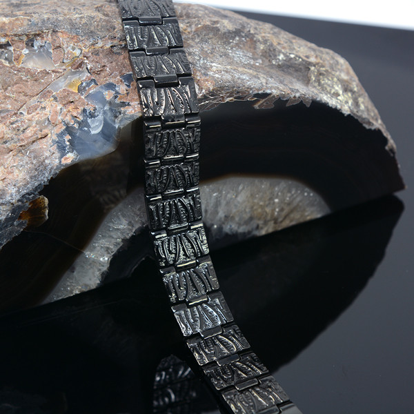 <img src="mens  magnetic bracelet .png" alt="casual magnetic therapy jewelry  strong side view   Novoa Men's Quad-Element Polished Silver Titanium Magnetic Bracelet with Carbon Fiber Inlays  ">