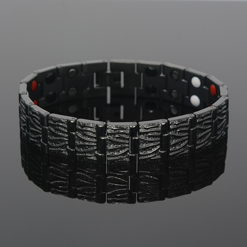 <img src="mens  magnetic bracelet .png" alt="casual magnetic therapy jewelry  strong  front view   Novoa Men's Quad-Element Polished Silver Titanium Magnetic Bracelet with Carbon Fiber Inlays  ">
