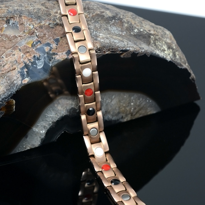 <img src="mens gold color magnet bracelet .png" alt="casual magnetic therapy jewelry  strong side view    magnetic-bracelet-jewelry   Novoa Men's Rose Gold Colored    Novoa Men's Quad-Element Rose Gold Colored Titanium Magnetic Bracelet  ">