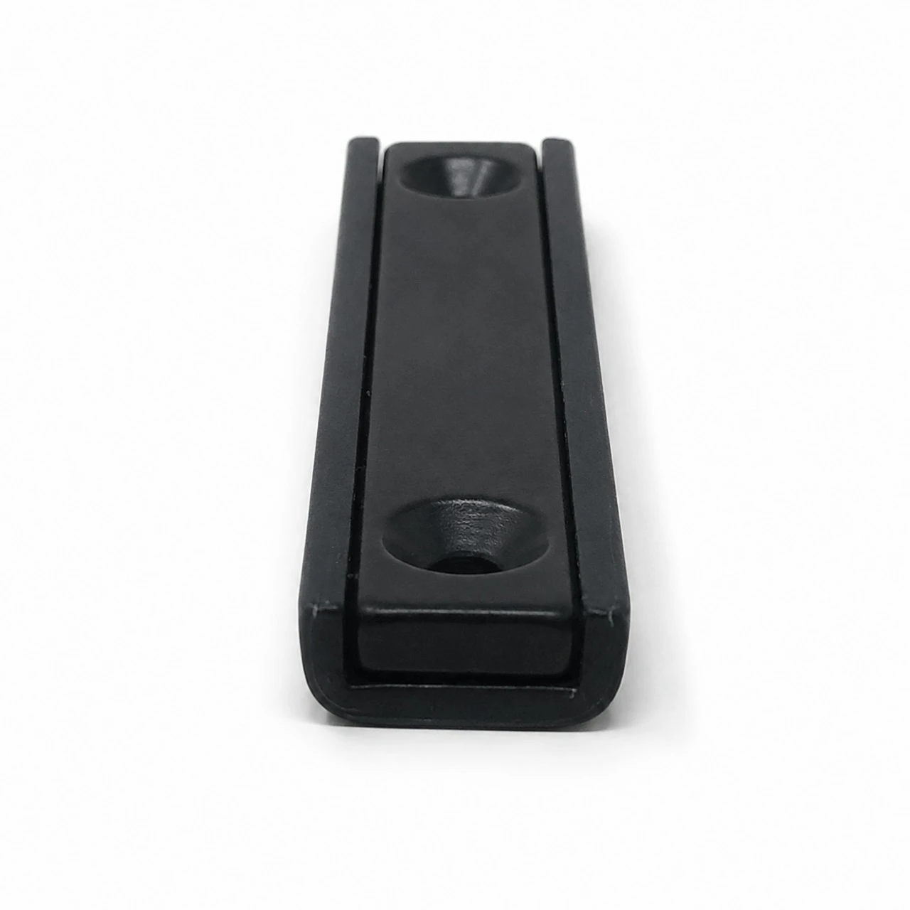 Dimensional view of 60x13.5x5 mm black epoxy neodymium channel magnet showing steel channel enclosure and mounting holes