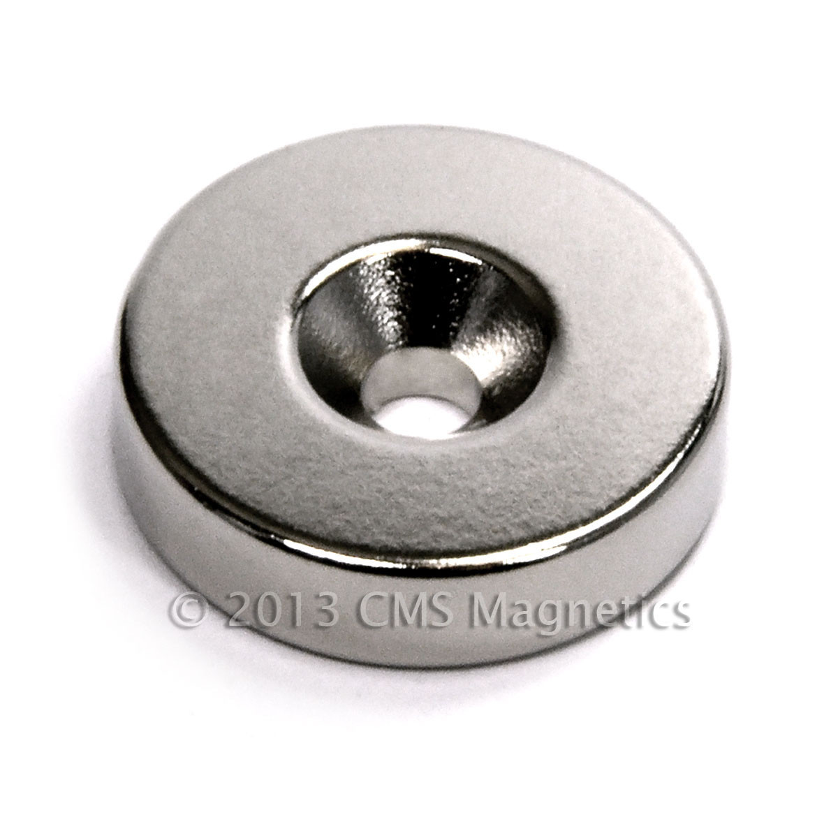Top view of strong N42 countersunk neodymium disc magnet 1"x1/4", axially magnetized for crafts and mounting applications