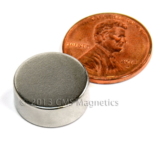 Side view of strong N52 rare earth disc magnet 0.625"x0.25", 16.5 lbs pull for crafts and magnetic closures