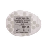 An egg-shaped container of sugar-free breath mints, featuring a label with ingredients and nutritional facts.