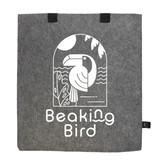 A grey tote bag made of RPET felt features a graphic of a bird and has two black handles, along with a logo.