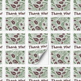 A sheet of stickers featuring a "Thank You" design in green and brown tones, with a decorative pattern.
