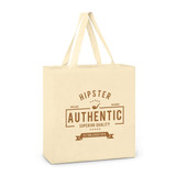 A cream cotton tote bag with two handles, featuring a logo and branding elements in brown.