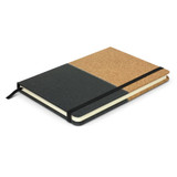 A notebook with a cork cover and dark green fabric, featuring an elastic band closure and a ribbon bookmark.