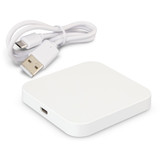 A square white wireless charger with a USB cable. The charger has a sleek design and a simple appearance.
