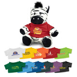A zebra plush toy wearing a red shirt, with various colourful shirts displayed below it. The toy is black and white.