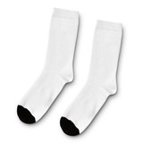 A pair of white crew socks with black toe caps, featuring a logo on one sock.